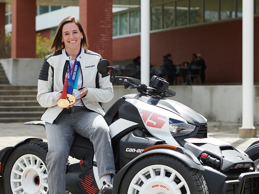 Ambassador Melodie Daoust, with her Can-Am On-Road 3-wheel motorcycle