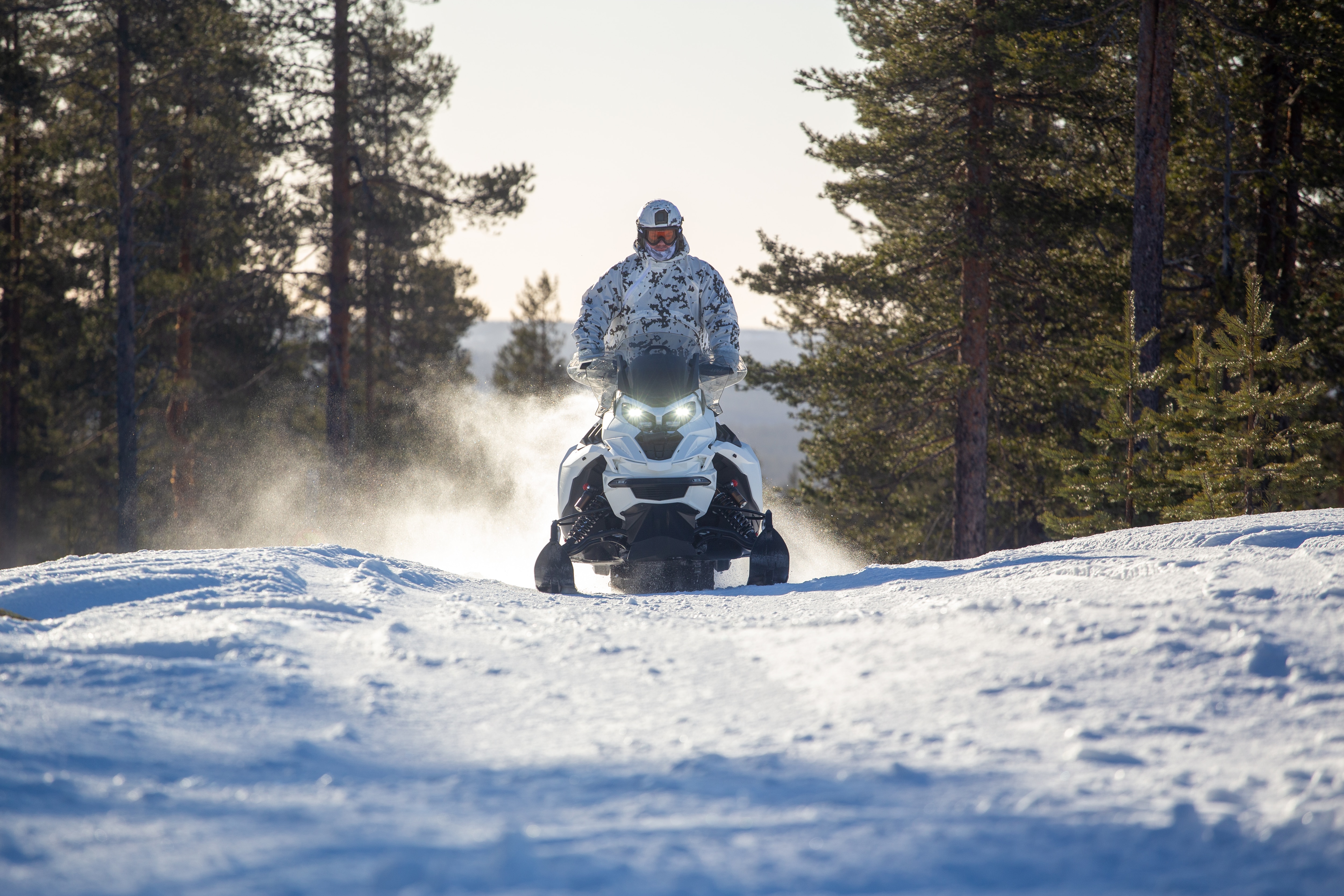 Military personel on a Lynx Snowmobile
